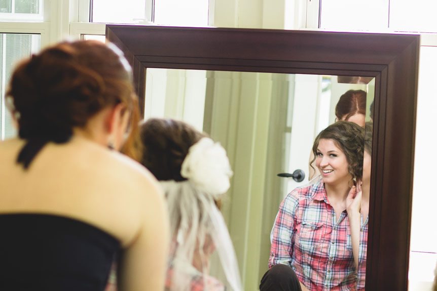 The young bride gets her hair done as captured by Listowel wedding photographer