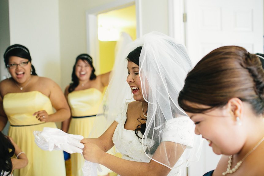 A funny moment between the bride and her bridesmaids as captured by Toronto wedding photojournalist
