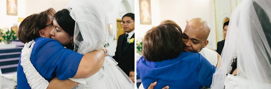 an emotional moment during a Filipino Catholic wedding ceremony at the Our Lady of Assumption Church in Toronto, Ontario