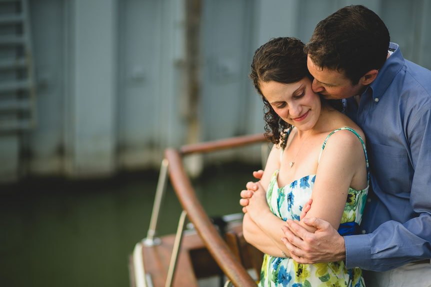 a romantic moment between a couple on their boat by Toronto wedding photographer