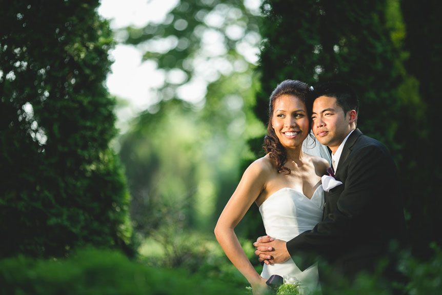 Toronto documentary wedding photographer photographs a portrait of the bride and groom at Liuna Gardens
