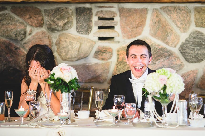 A funny moment at a Waterstone Estate and Farms wedding reception by Newmarket Wedding Photographer.