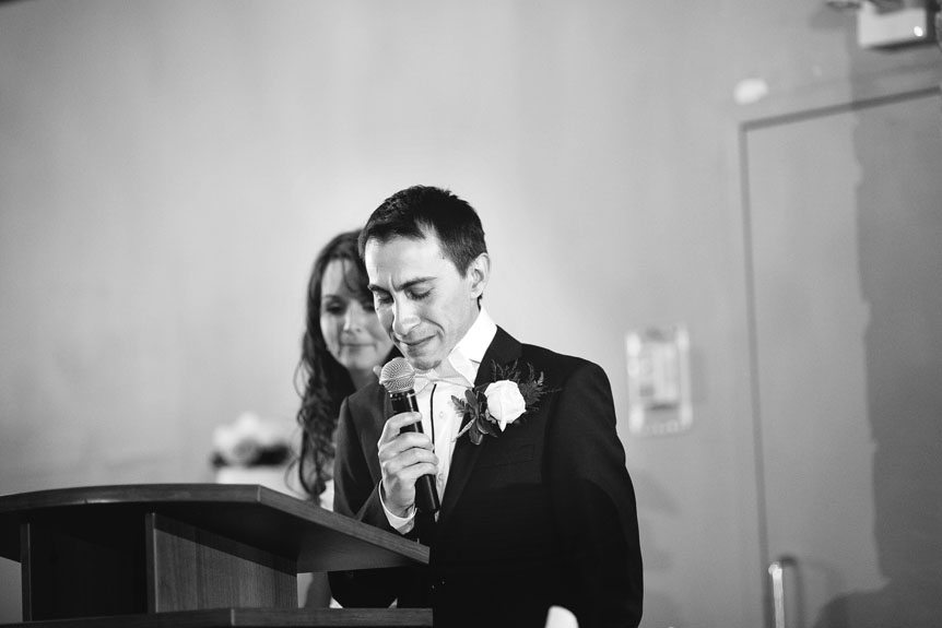An emotional moment as the groom gives his speech at their Waterstone Estate and Farms wedding as photographed by Newmarket Wedding Photographer.