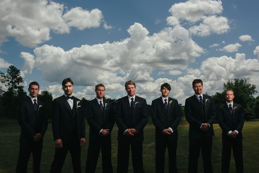 Cambridge Documentary Wedding Photographer shows a portrait of the groom and his groomsmen