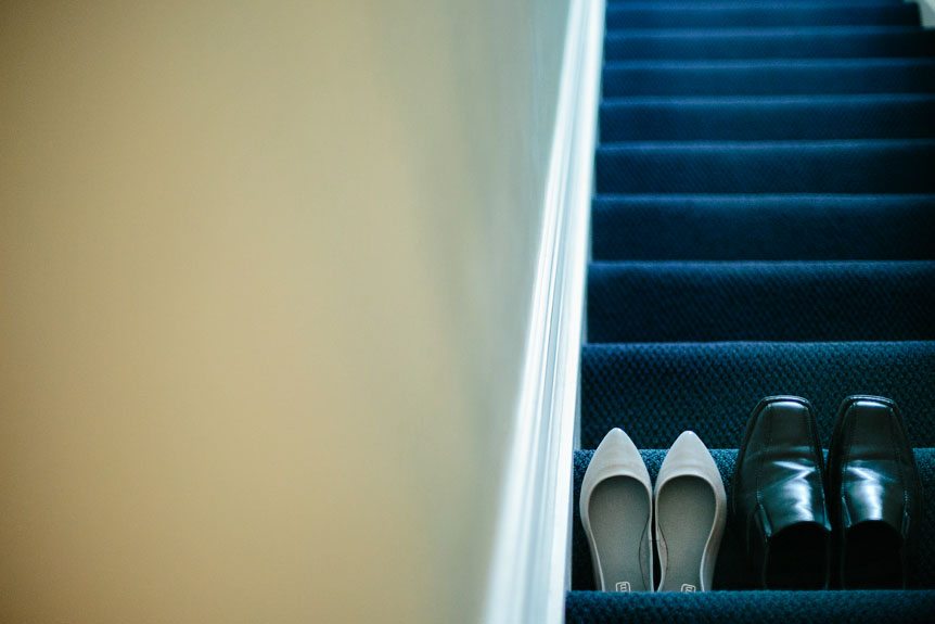 Detail shots of the bride and groom's shoes photographed by Jordan, Ontario wedding photographer.