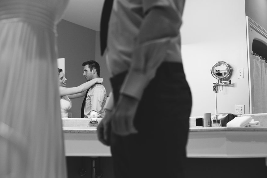 Jordan, Ontario wedding photographer photographs the bride and groom before their intimate Flat Rocks Cellars Wedding ceremony as they got ready.