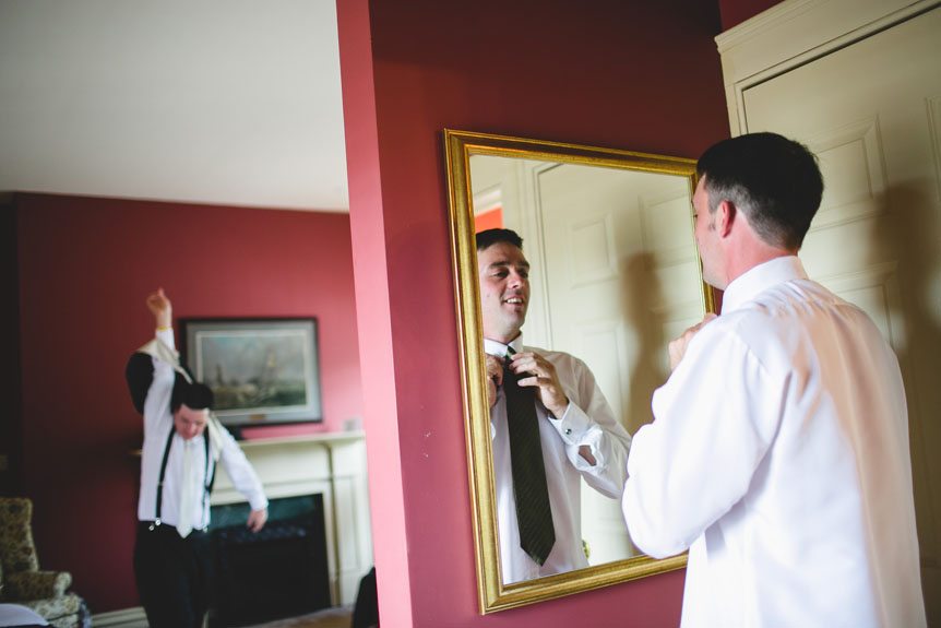 The groom and his groomsmen get ready as photographed by Documentary Style Wedding Photography studio