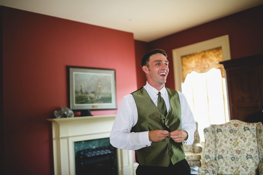 Documentary Style Wedding Photography studio photographs the groom get ready at his suite at The Waddell.