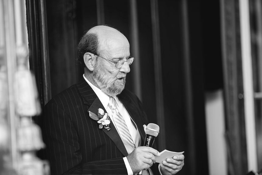 Father of the bride gives a speech at his daughter's Penryn Mansion wedding as photographed by Documentary Style Wedding Photography studio.