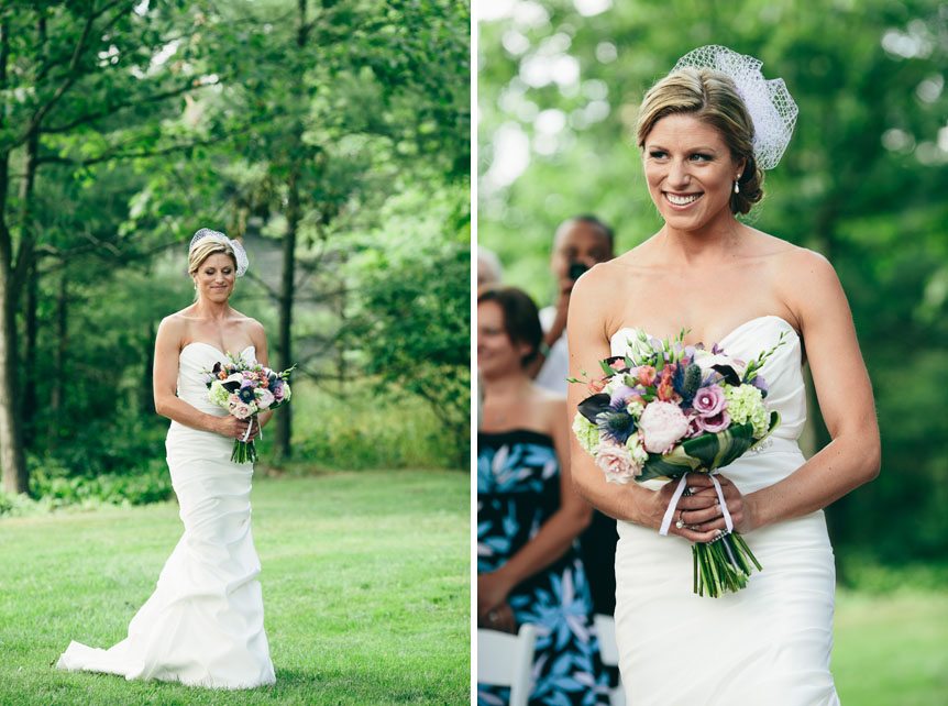 The beautiful bride walks down the aisle at a Langdon Hall outdoor wedding as photographed by Toronto wedding photographer.