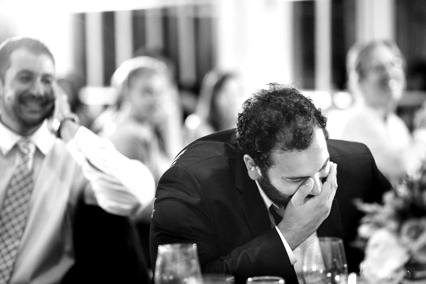 Toronto wedding photographer captures funny candid moments at a Langdon Hall wedding reception.