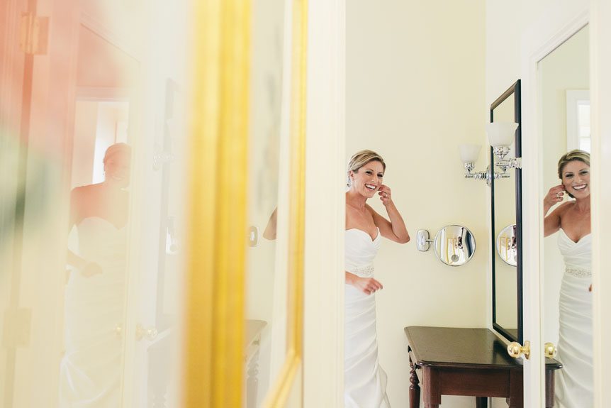 Beautiful bride gets ready at the Langdon Hall bridal suite as photographed by Toronto wedding photographer.