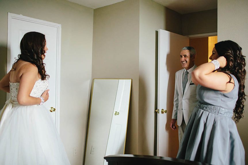 Toronto documentary wedding photographer captures the moment where the father of the bride sees his daughter for the first time as a bride.