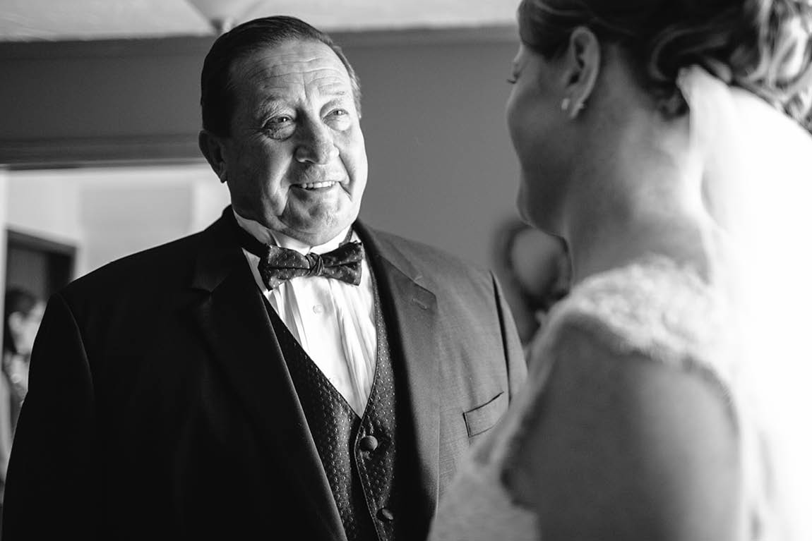 Father of the bride reacts to seeing the bride for the first time.