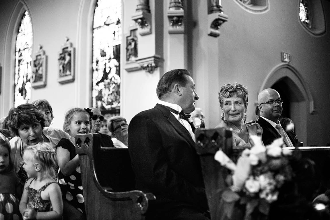 Documentary wedding photographer captures an emotional moment between the bride's parents.