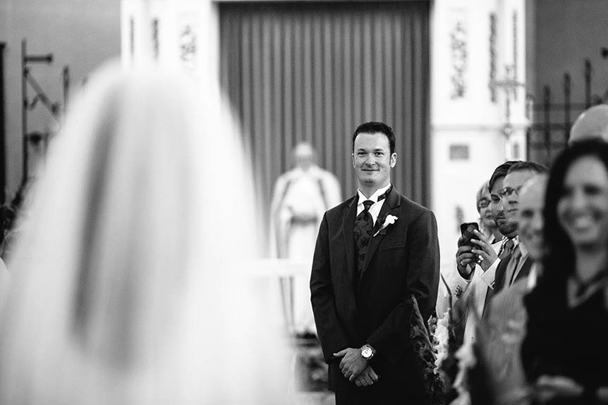 The groom sees the bride for the first time at an Ingersoll wedding ceremony.