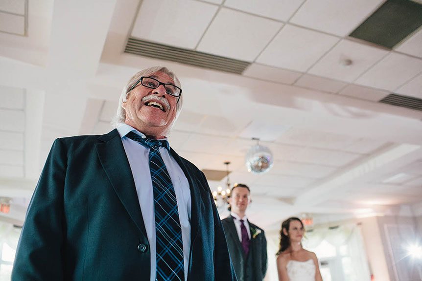Wedding photographer in Ingersoll captures candid moments at an Elm Hurst Inn wedding.