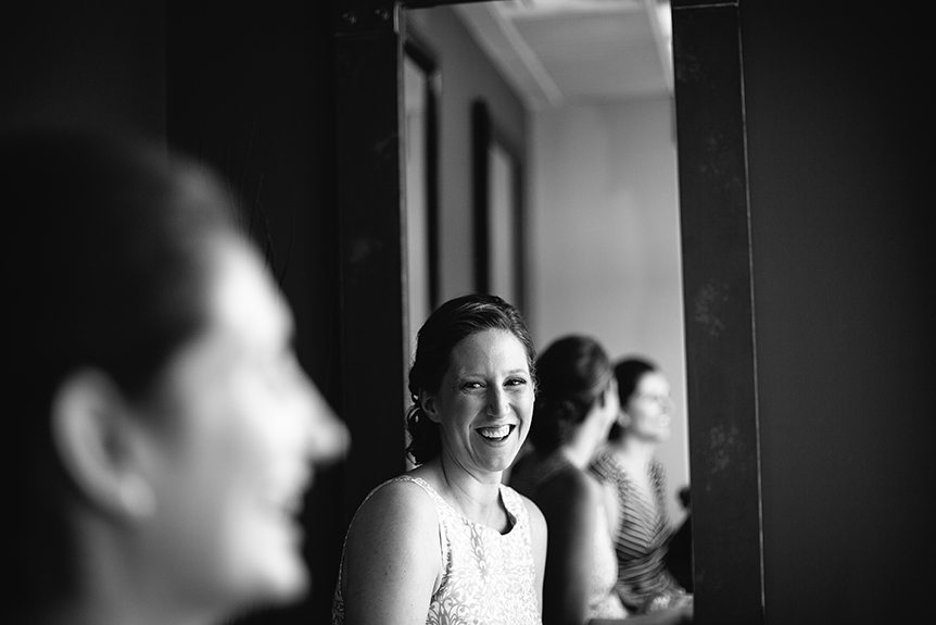 The bride gets ready before her wedding in St Jacob's photographed by a wedding photojournalist.