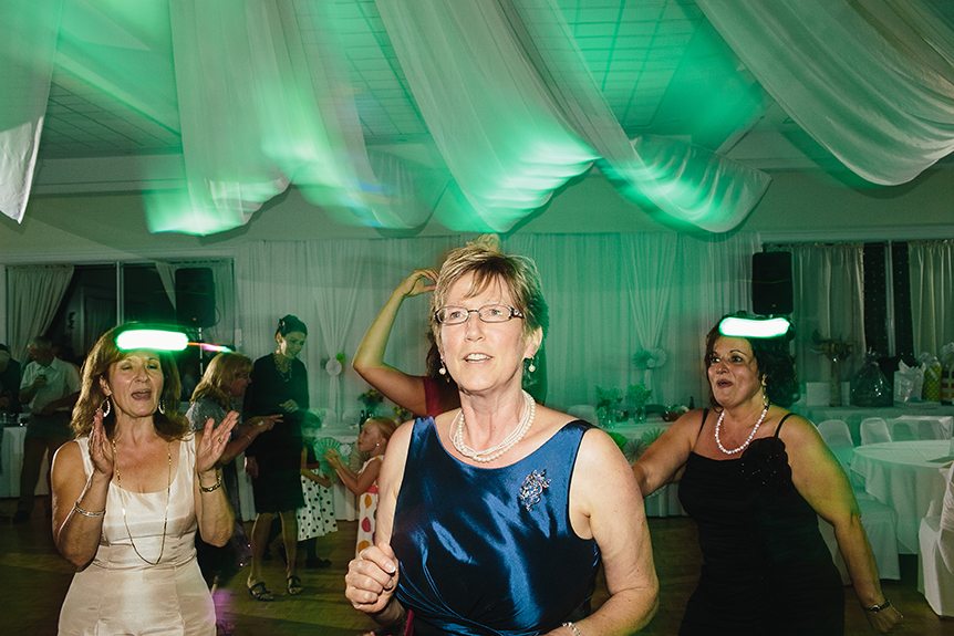 The mother of the bride at a Three Bridges Banquet Hall wedding having a great time at a wedding.