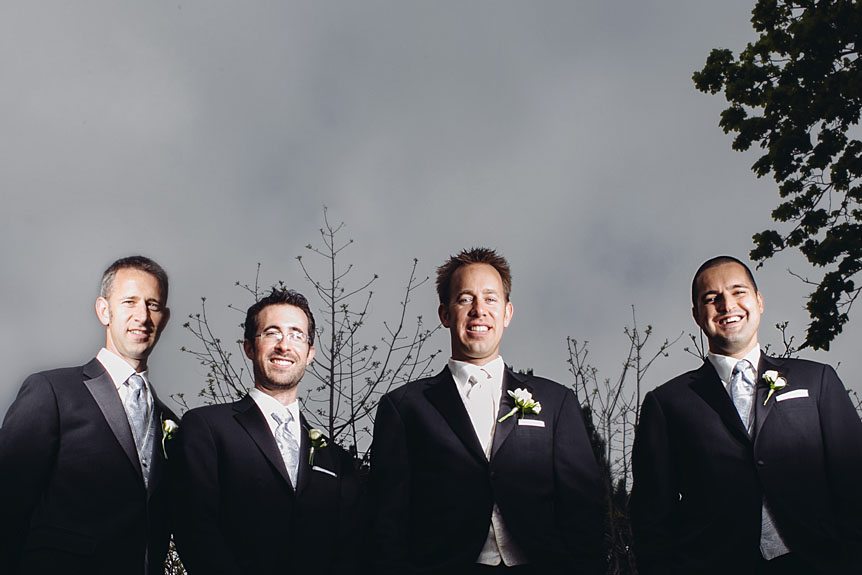 Cool portrait of the groom and his groomsmen at the Mill Race Park.
