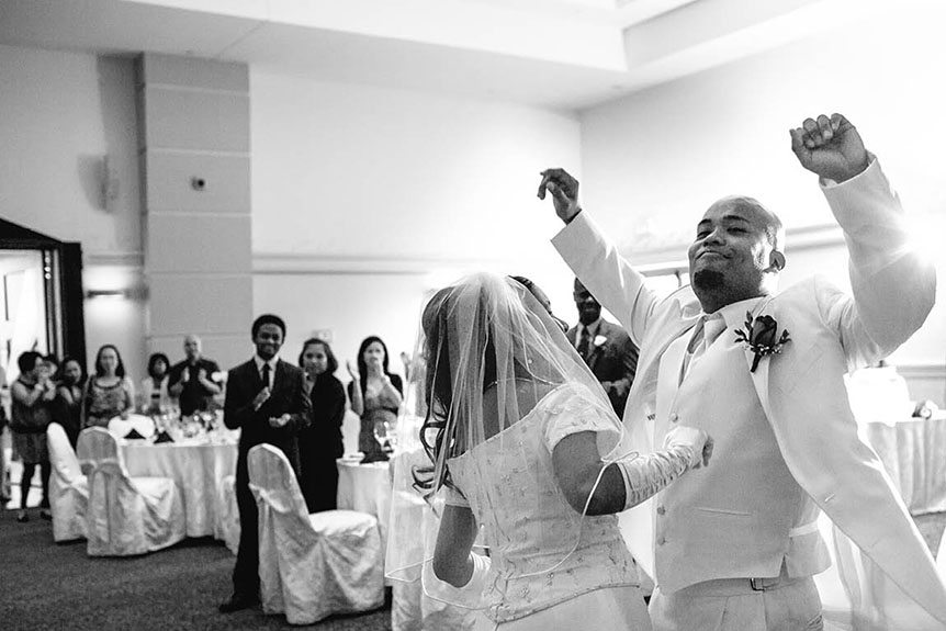 The bride and groom dances to their first dance song at the Grand Baccus Banquet and Conference Center.