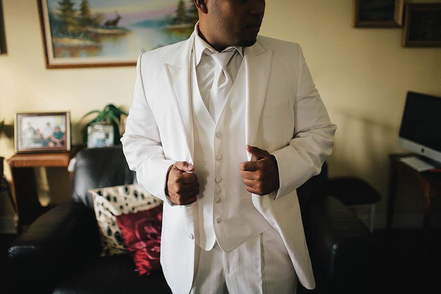 A Filipino groom gets ready before his wedding ceremony.