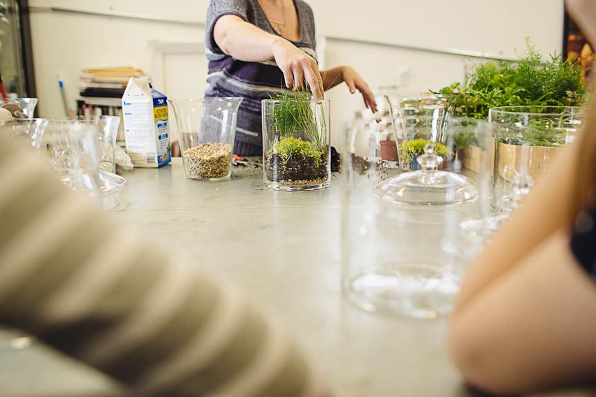 A class on building terrariums at a floral design class in Kitchener.
