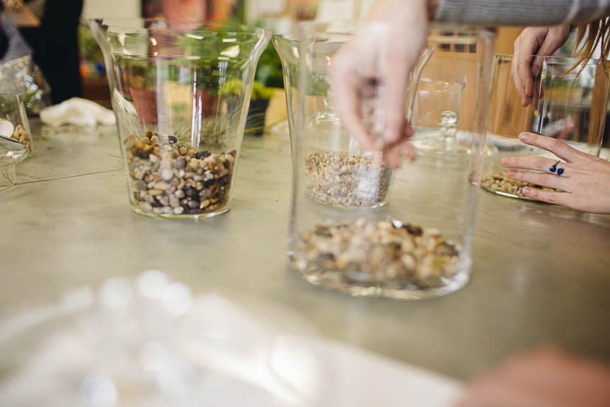 Students build their own terrariums in a Kitchener floral design class.