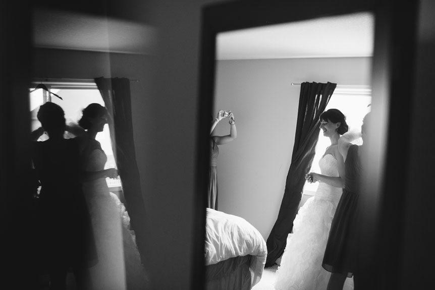 Creative wedding photography technique using reflections as shot by the best Toronto wedding photographer.