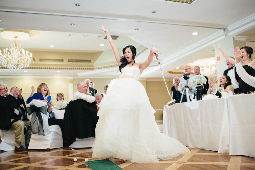 The bride puts for glory as the best Toronto wedding photographer captures the excitement.