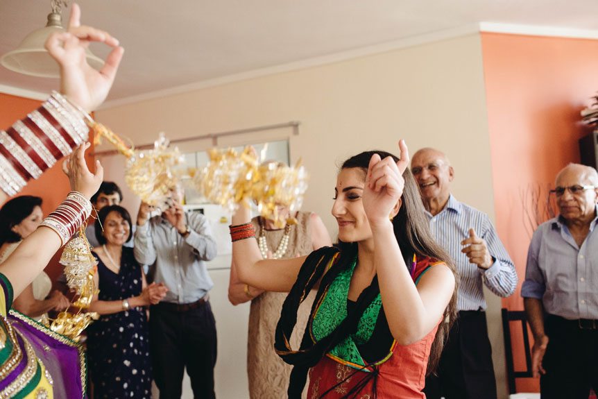 Wedding guests dance to Indian beats at a mhendi ceremony in Toronto.