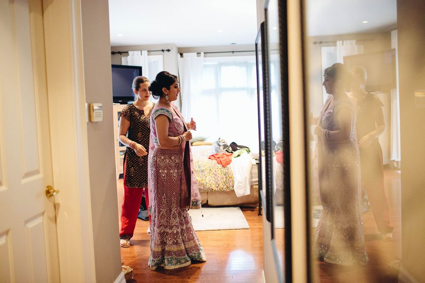 The bride gets ready before the wedding ceremony.