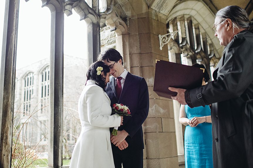 A young couple gets married at Knox College in Toronto.