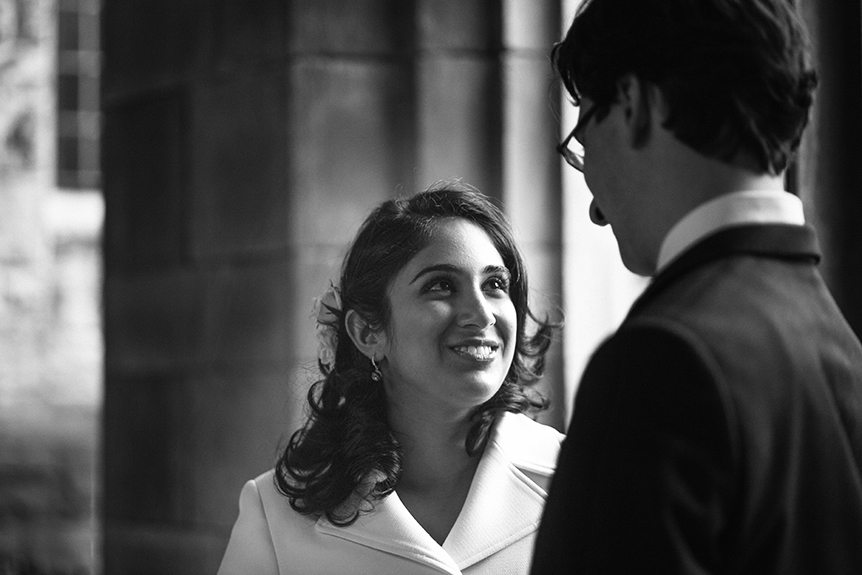 Black and white image of the bride as she listened to the groom.
