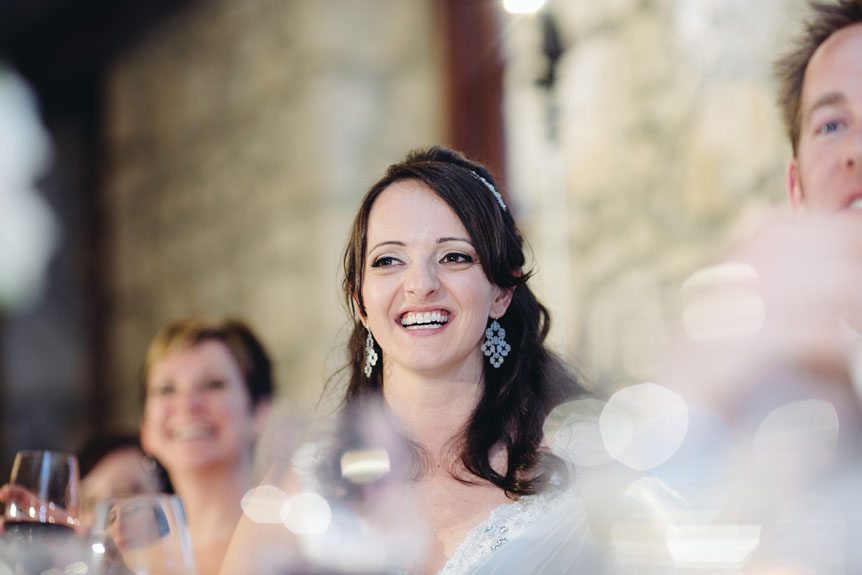 A photojournalistic moment captured at an elegant wedding at the Cambridge Mill.