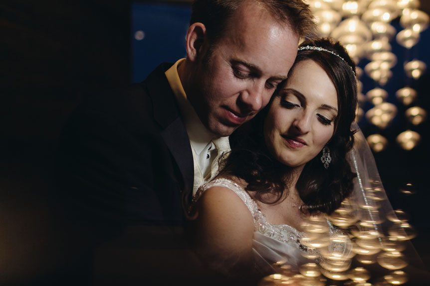 A creative portrait of the bride and groom.