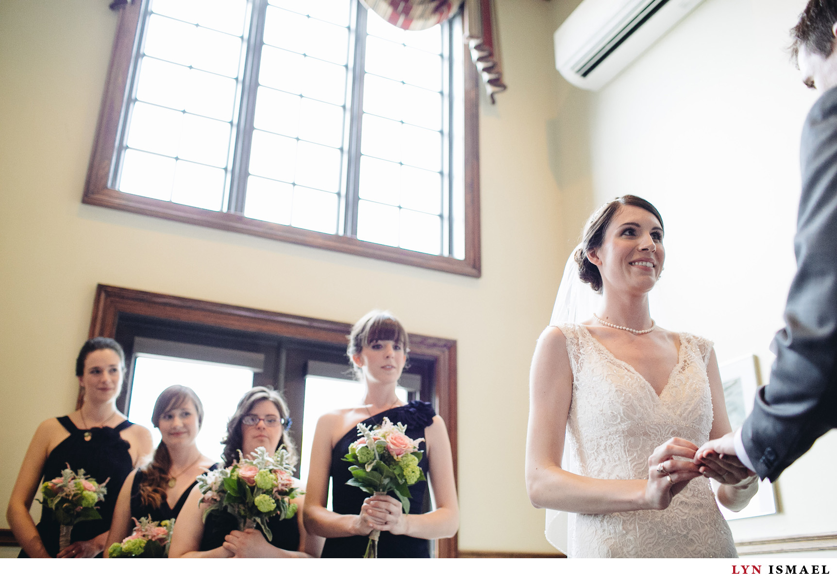 The bridesmaids watched as their friend got married.