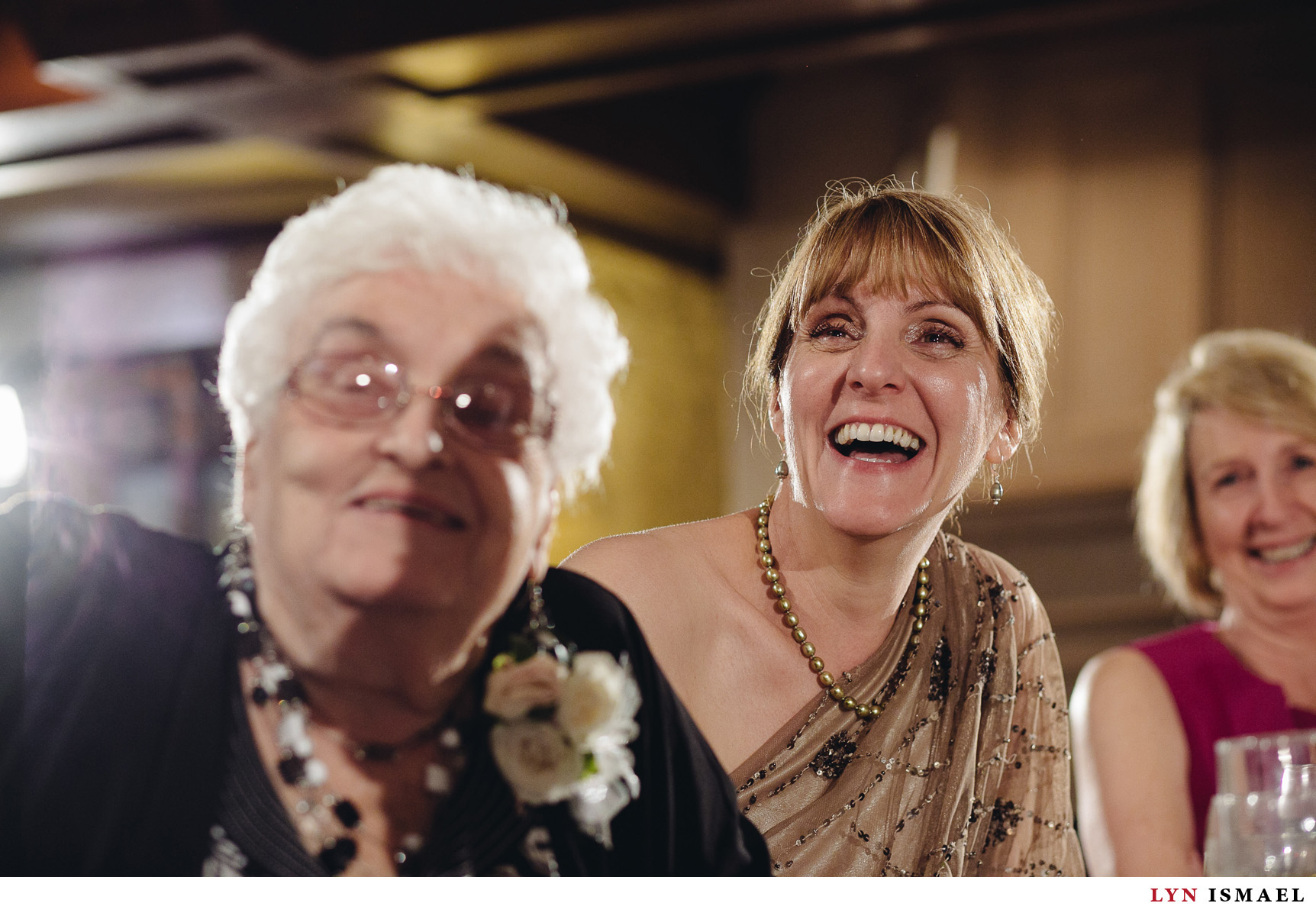 Mother of the bride reacts to the speeches.