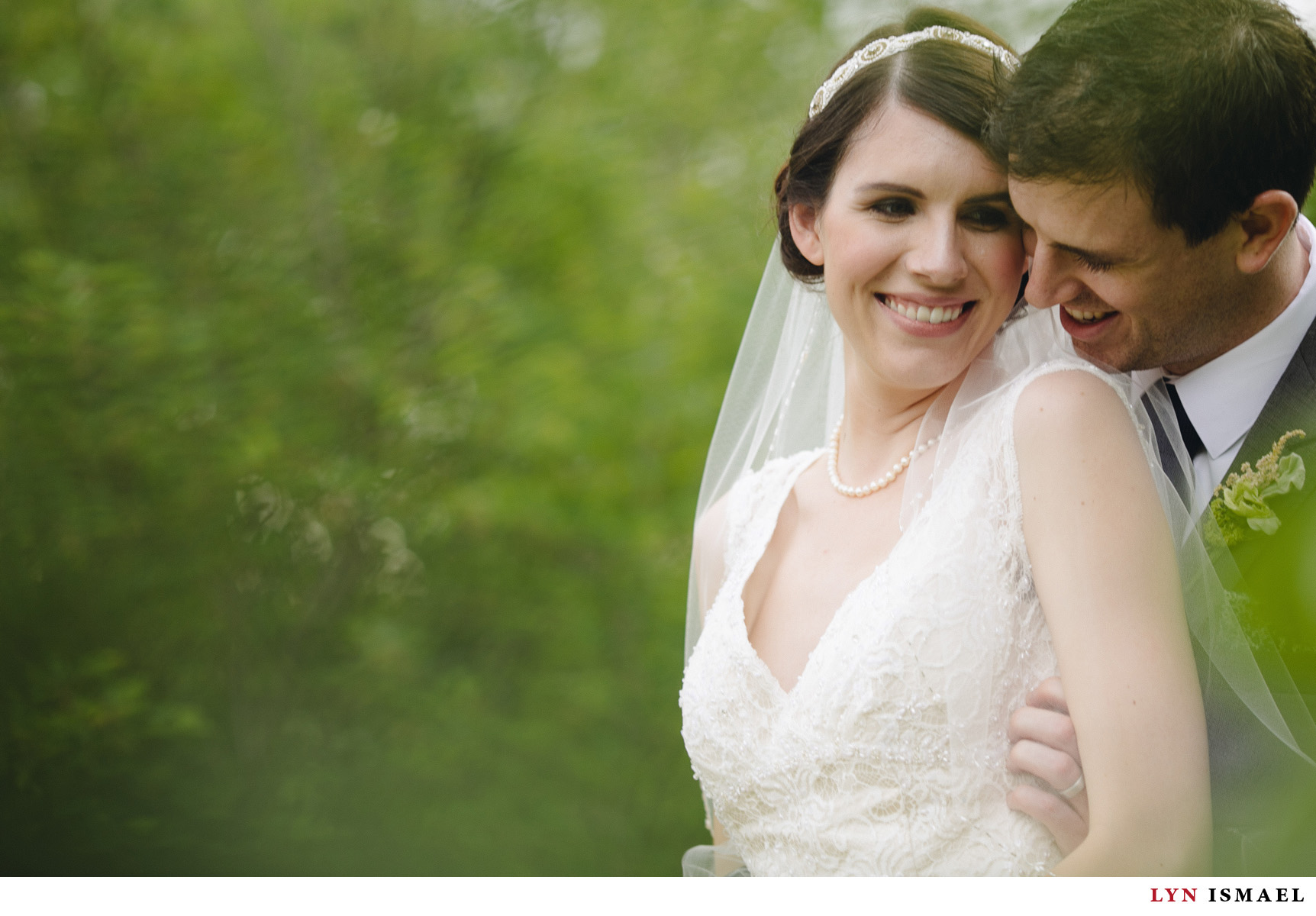 Beautiful bride and handsome groom portrait at the grounds of Windermere Manor