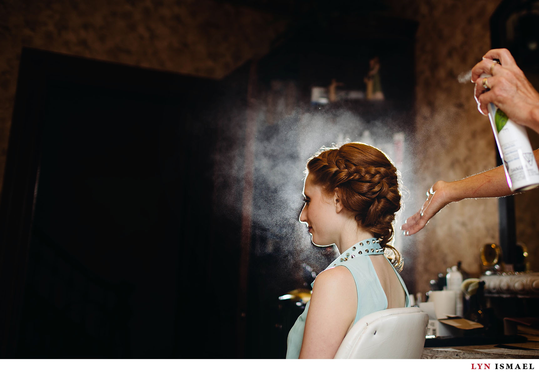 Bride gets her hair done at Nithridge Estate