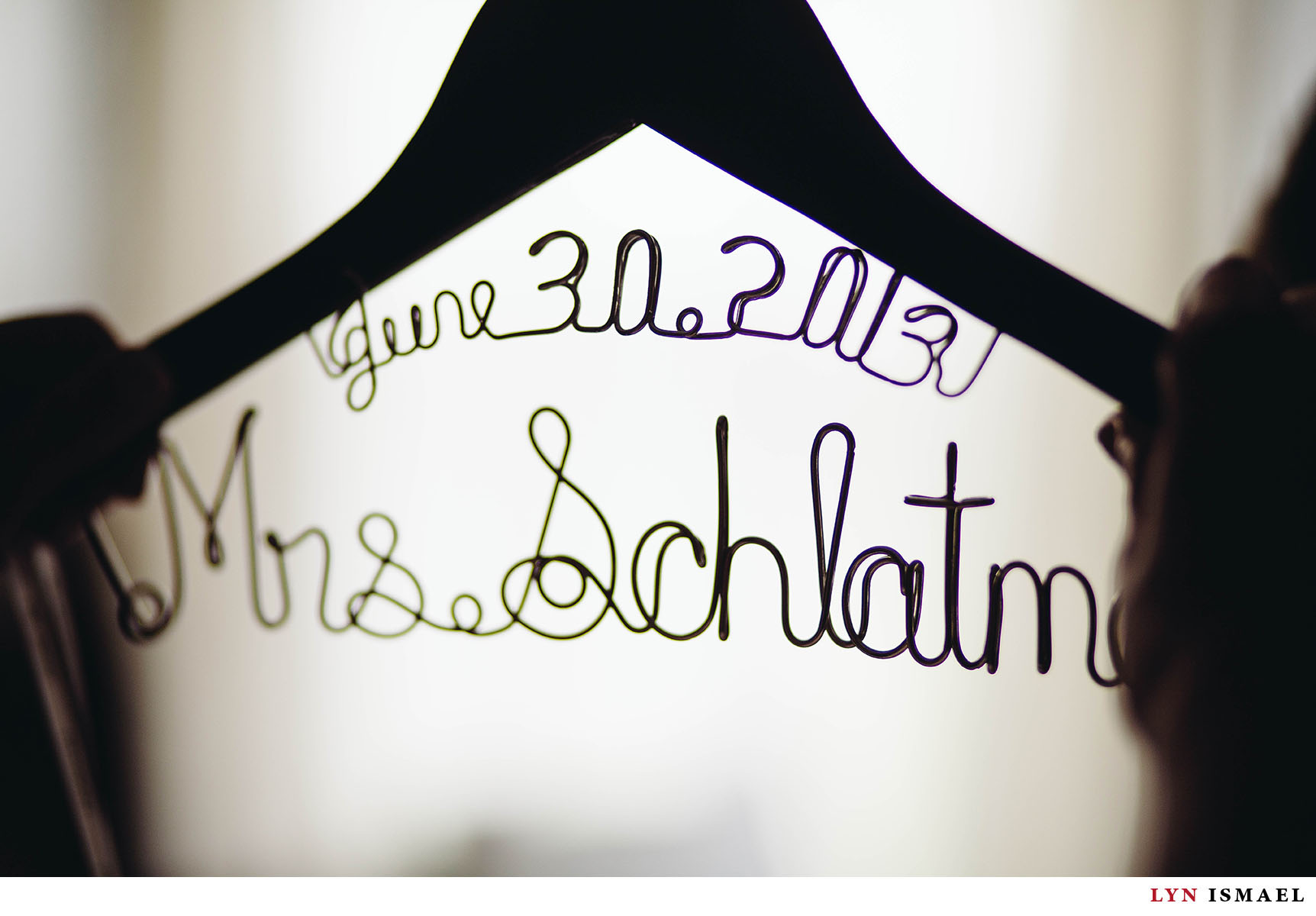 A detail of the wedding gown's hanger.