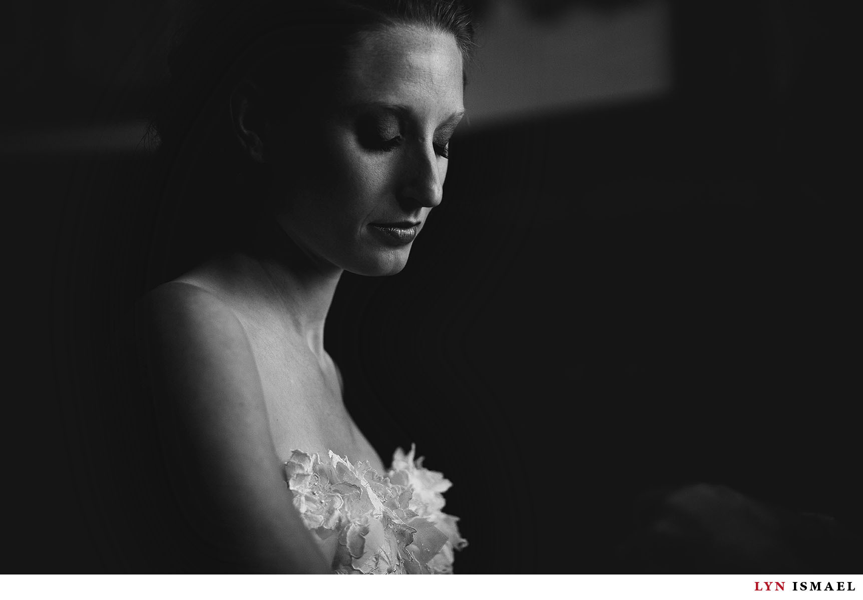 A dramatic moment captured as the bride get ready at Nithridge Estate.