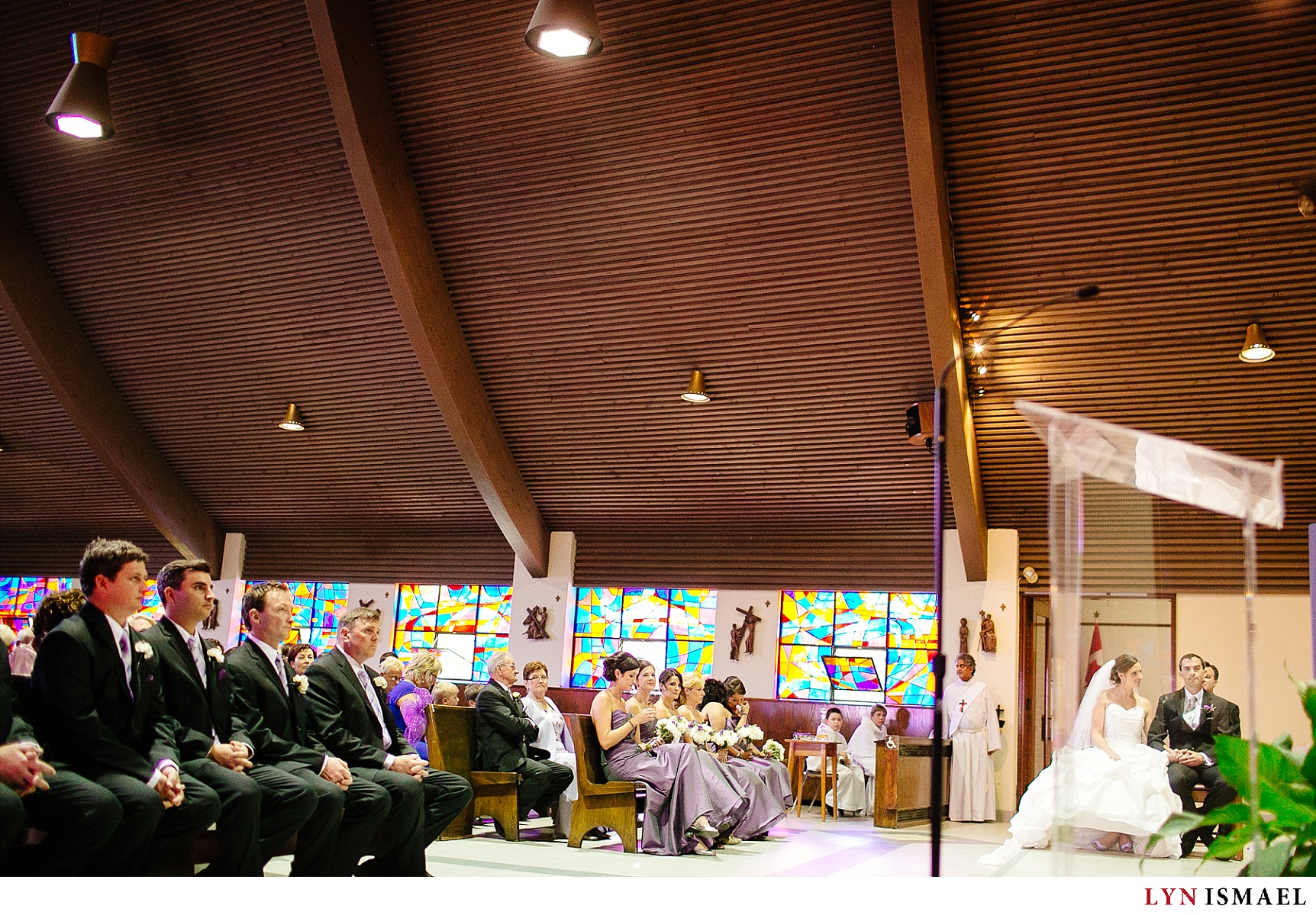 A layered photo of a wedding ceremony inside St Mike's Catholic Church in Waterloo