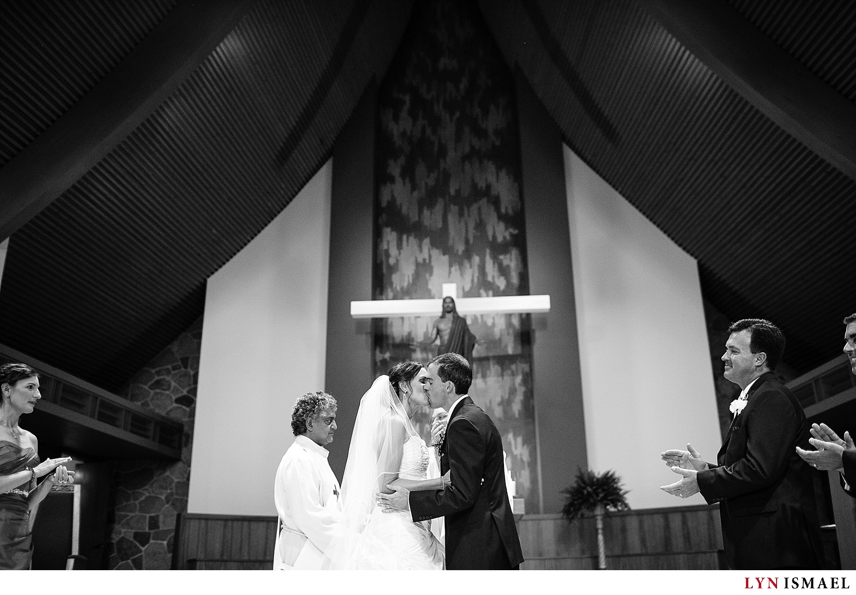 The first kiss at a Roman Catholic wedding.