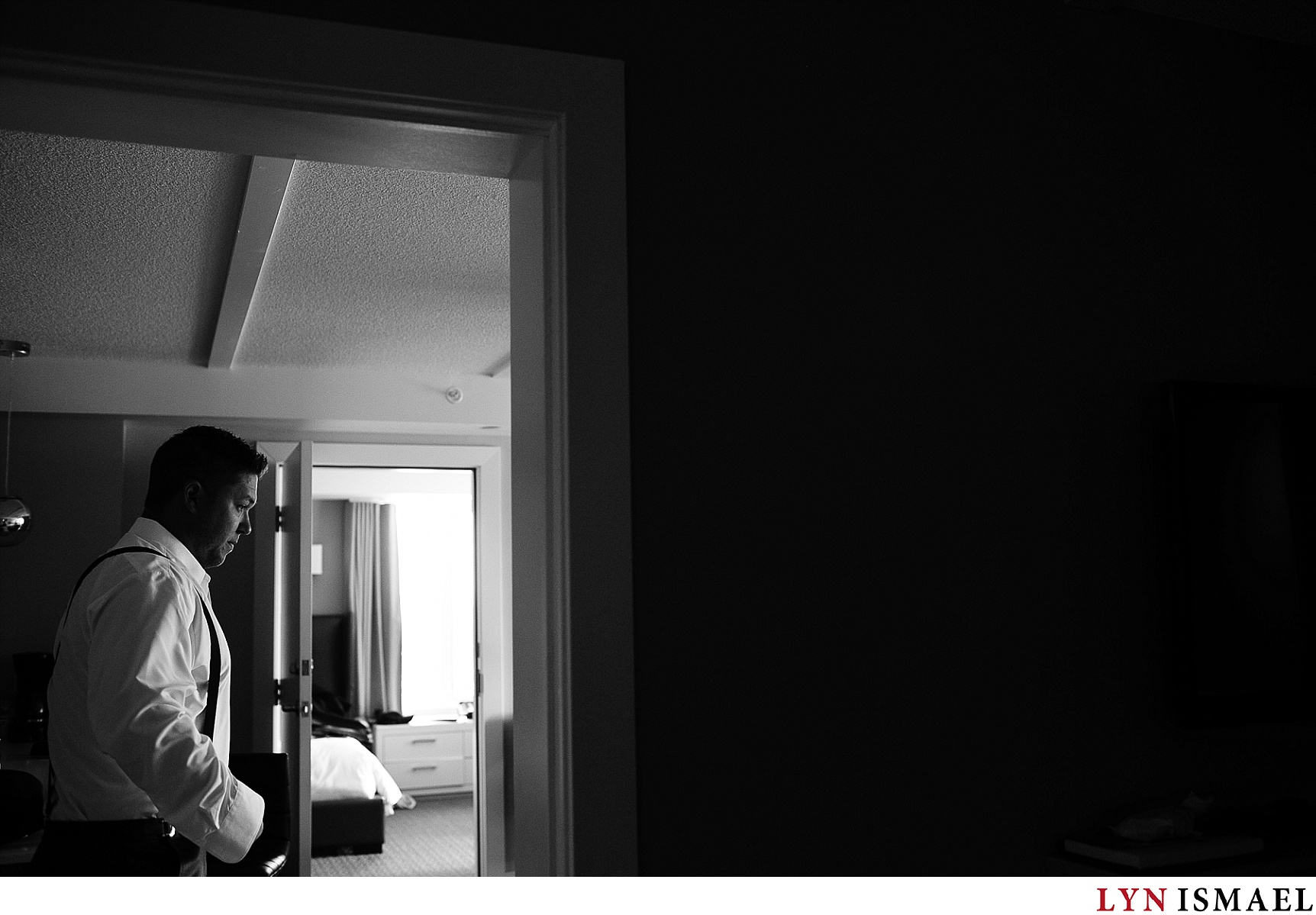 groom gets ready in his suite at the Cranberry Resort