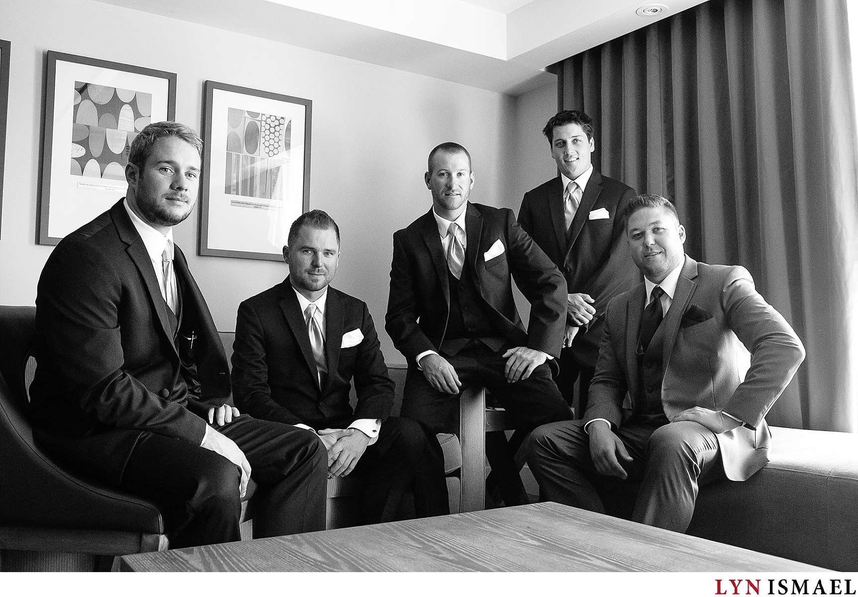 Black and white portrait of the groom and his groomsmen