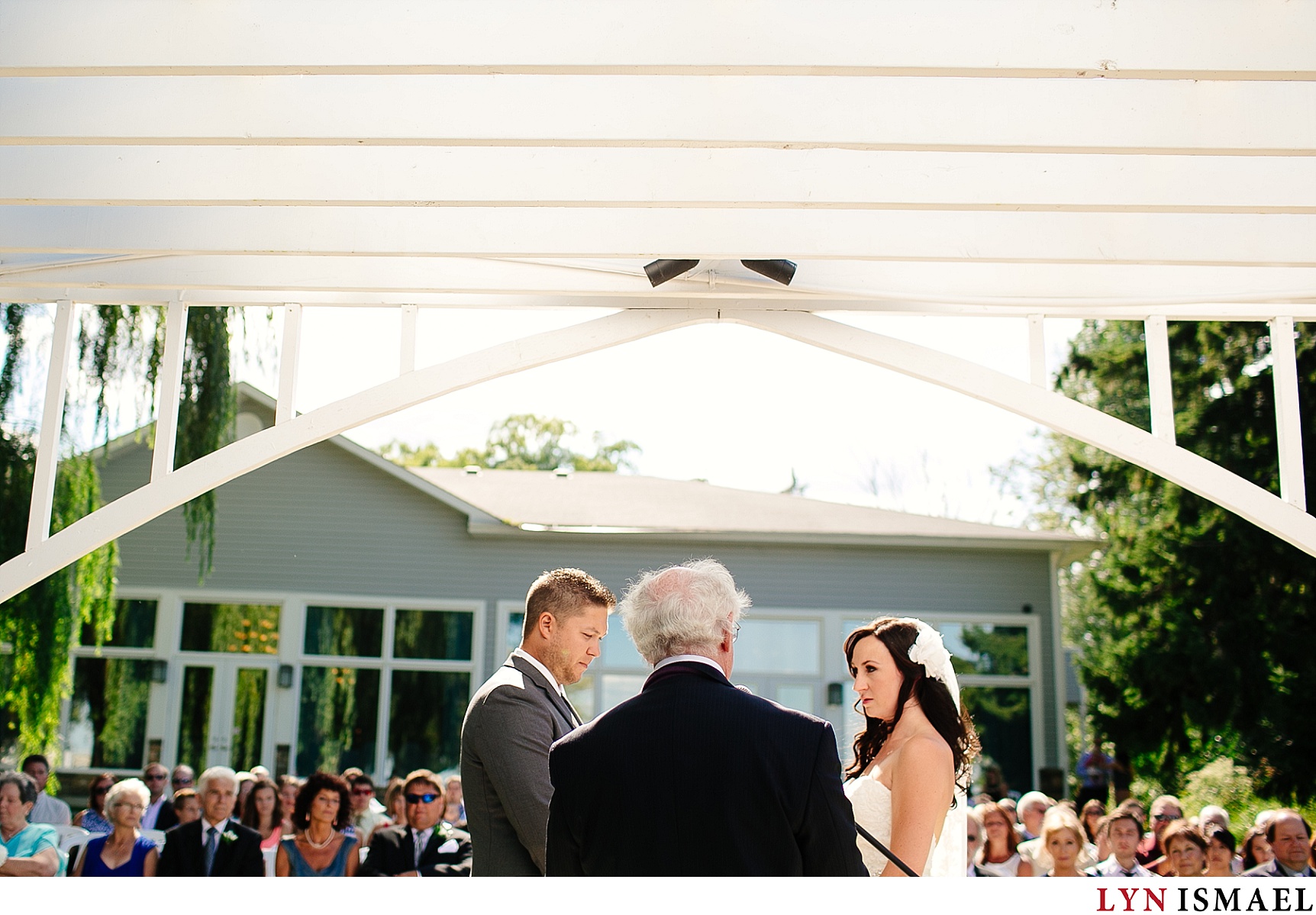 a wedding under the arbour at the Cranberry Resort venue.