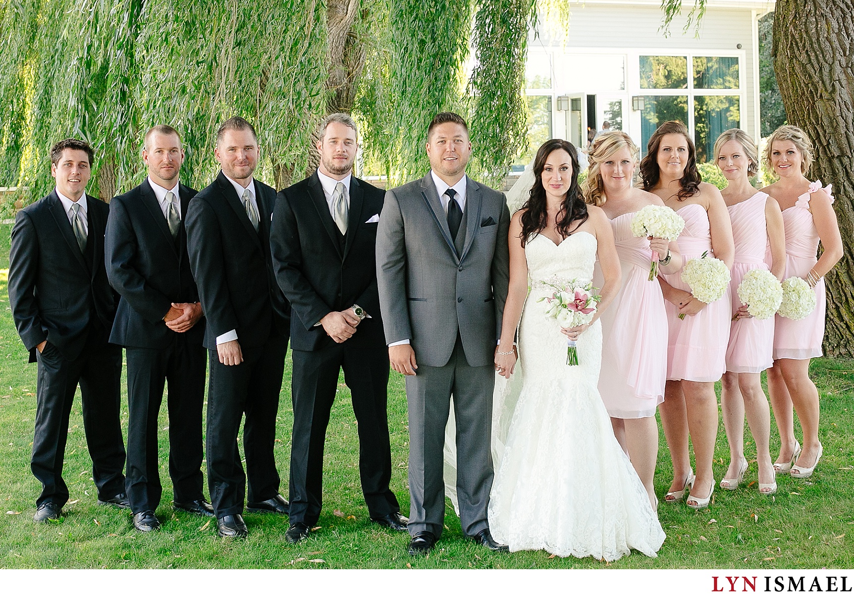 The wedding party under willow trees in Collingwood.