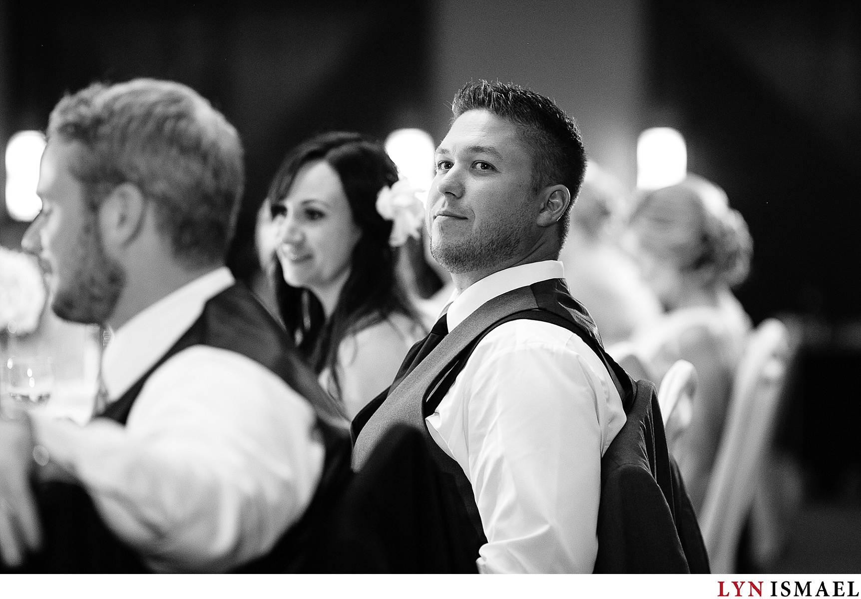 the groom listening to his mother's speech