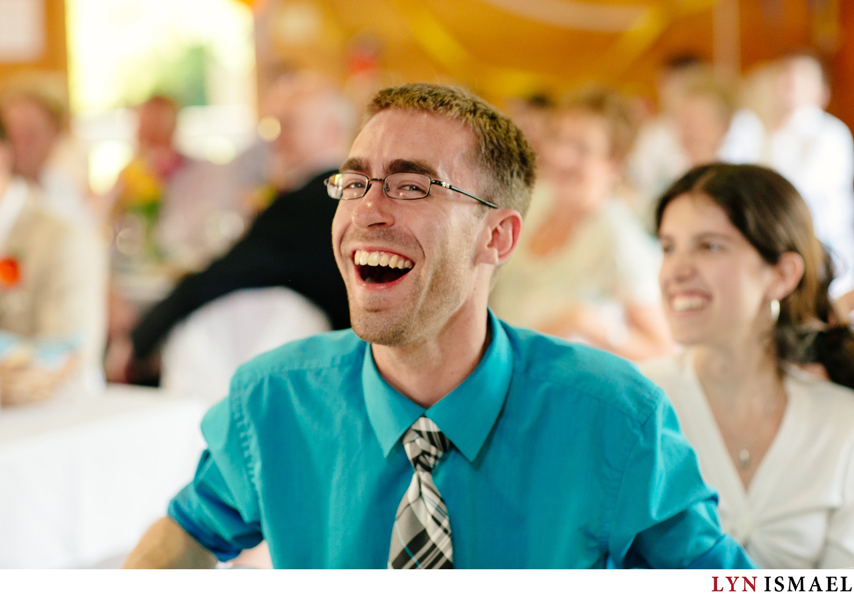 a guest laughing.